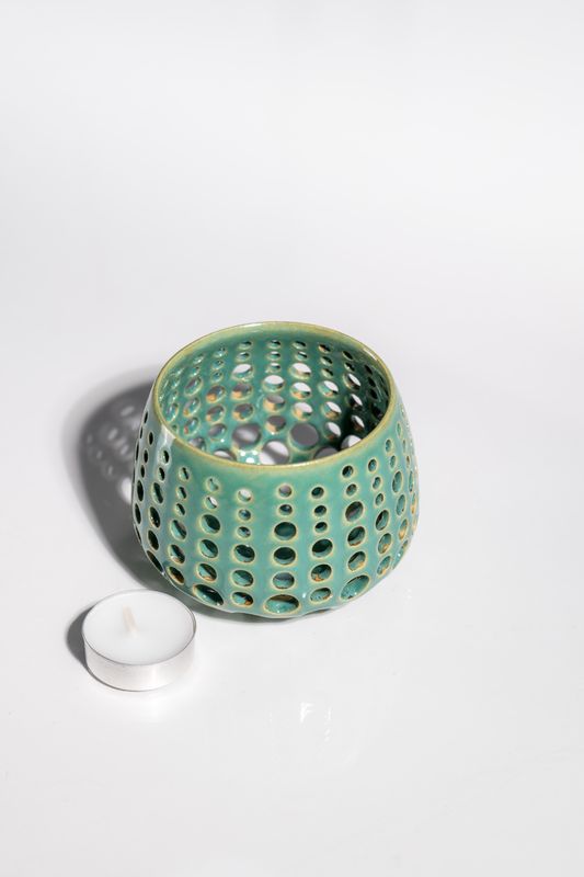 Coastal cottage inspired light blue and teal ceramic votive holder. Handmade by artisan crafters and makers.