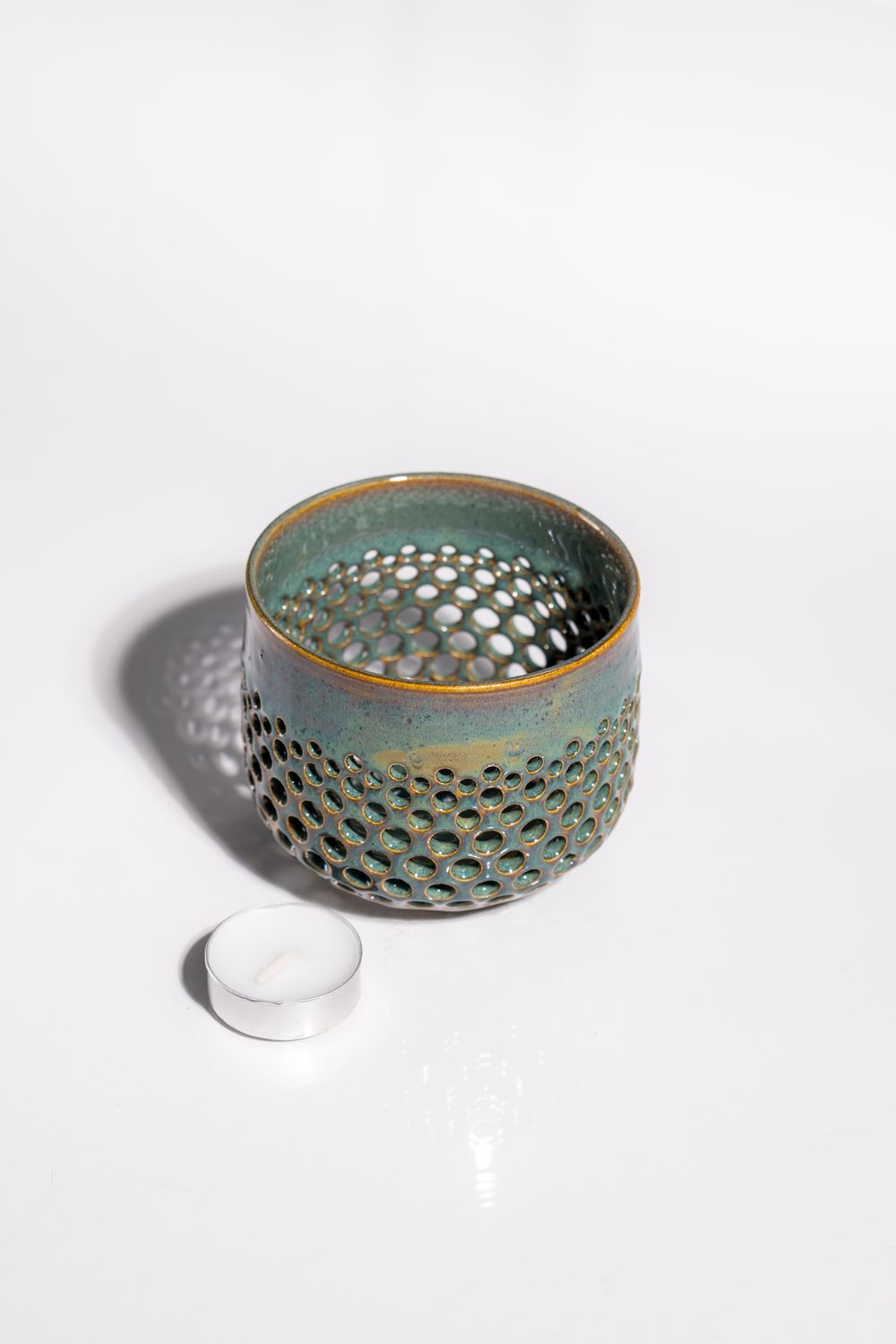 Juniper berry sage brush ceramic candleholder that fits cozy desert home with modern interior design and curated decor, 