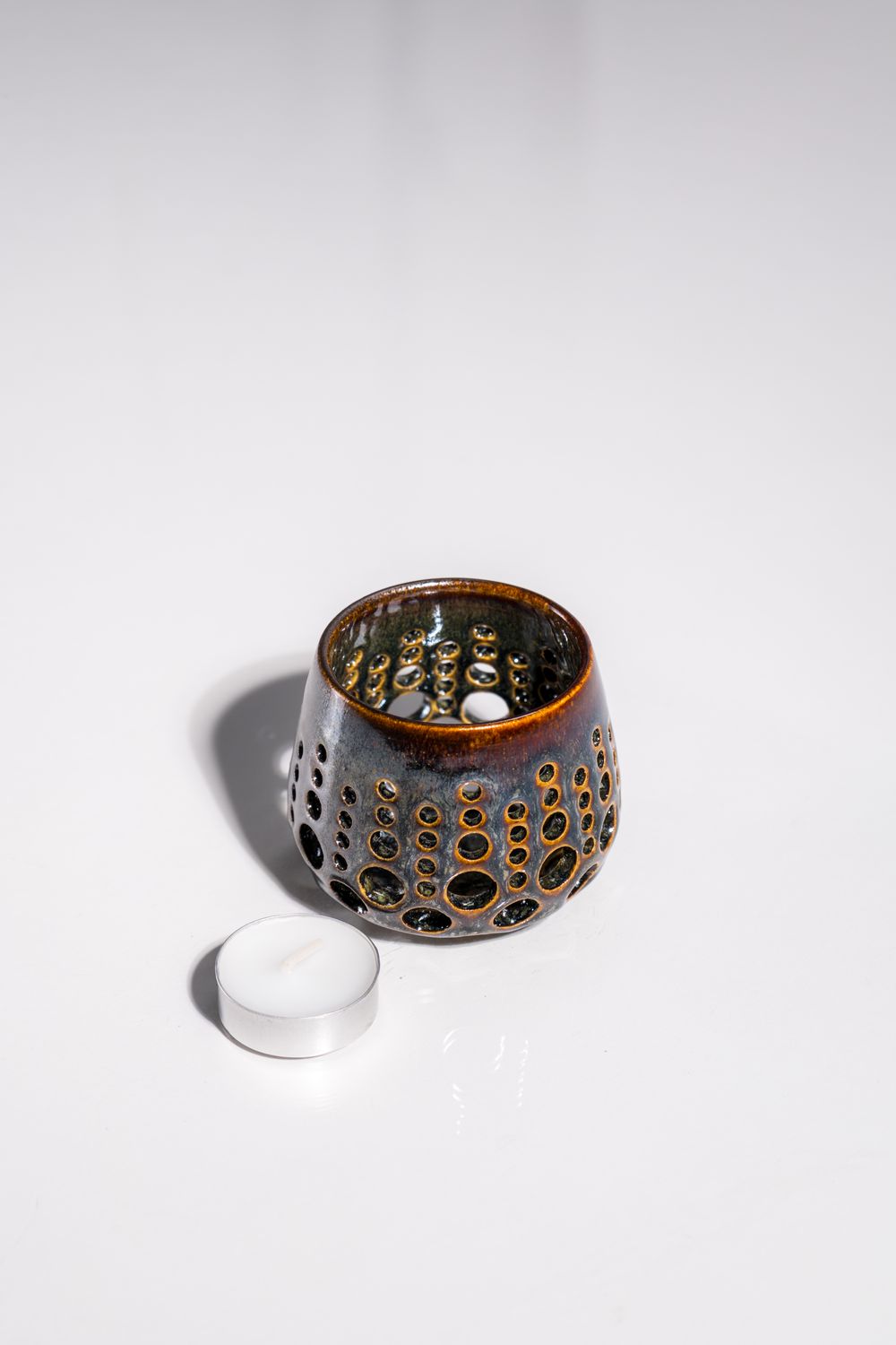 One of a kind home decor piece. Ceramic candle holder handmade in united states by local aritsts CORTERRA Washington State