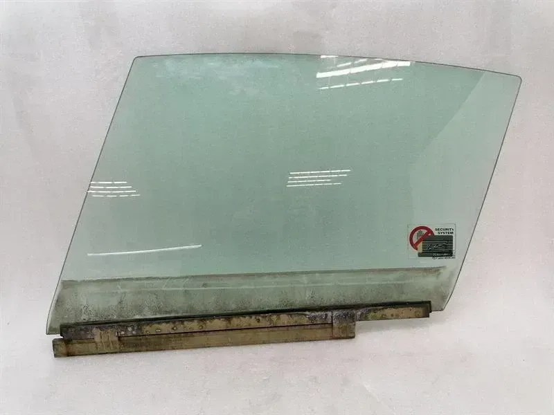 Porsche 911 993 left front door glass 99354201101 door window front left