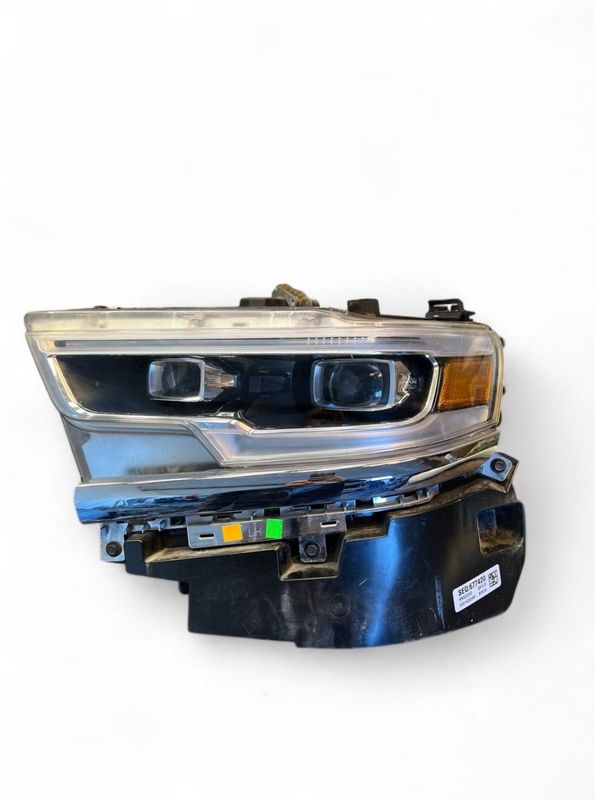 68316085AH K68316085AH Headlight left RAM 1500 Crew Cab Pickup (DT)(2018-)