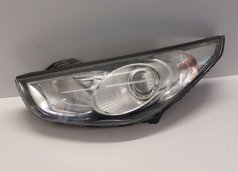 921012Y000 Headlight left HYUNDAI TUCSON II / ix35 I (LM) (2009-2017)