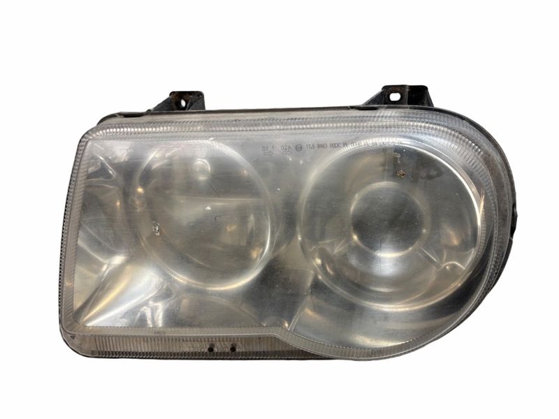 57010761AA Headlight left CHRYSLER 300C I (2004-2010)