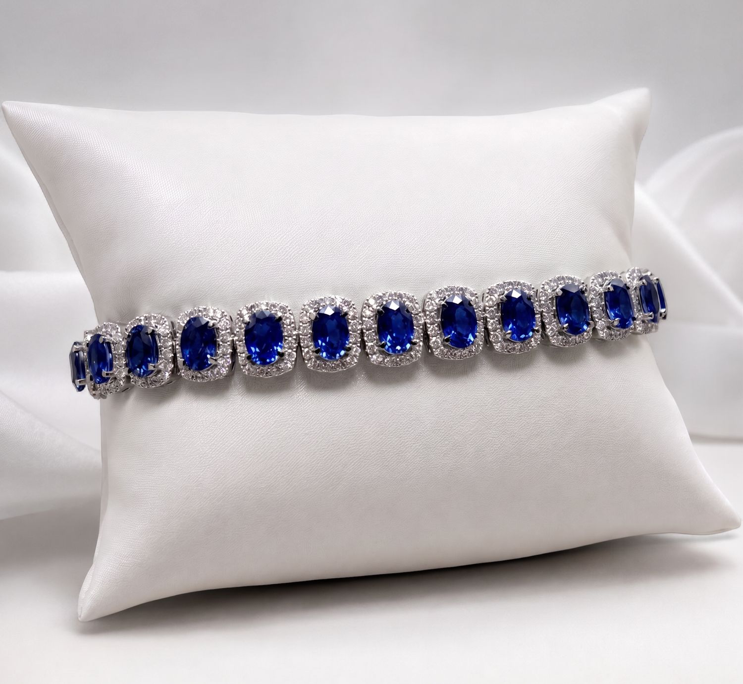 18KW 6x4 Oval Sapphire Halo Tennis Bracelet