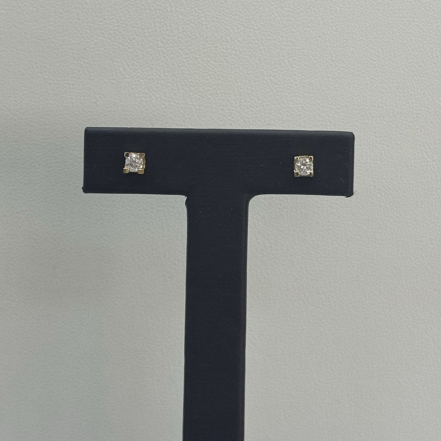 Diamond Stud Earrings..