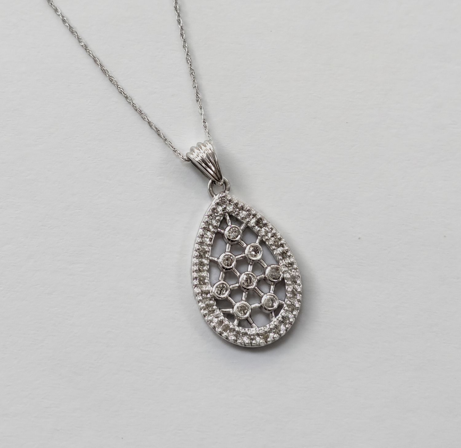 White Gold Intricate Tear Drop Diamond