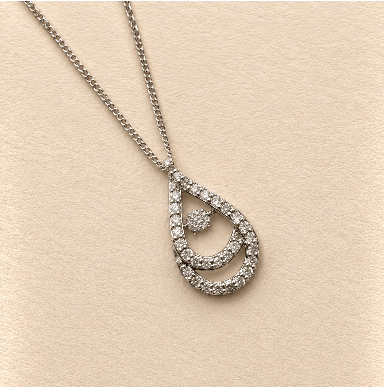 "Dancing Diamond" Teardrop Halo Pendant