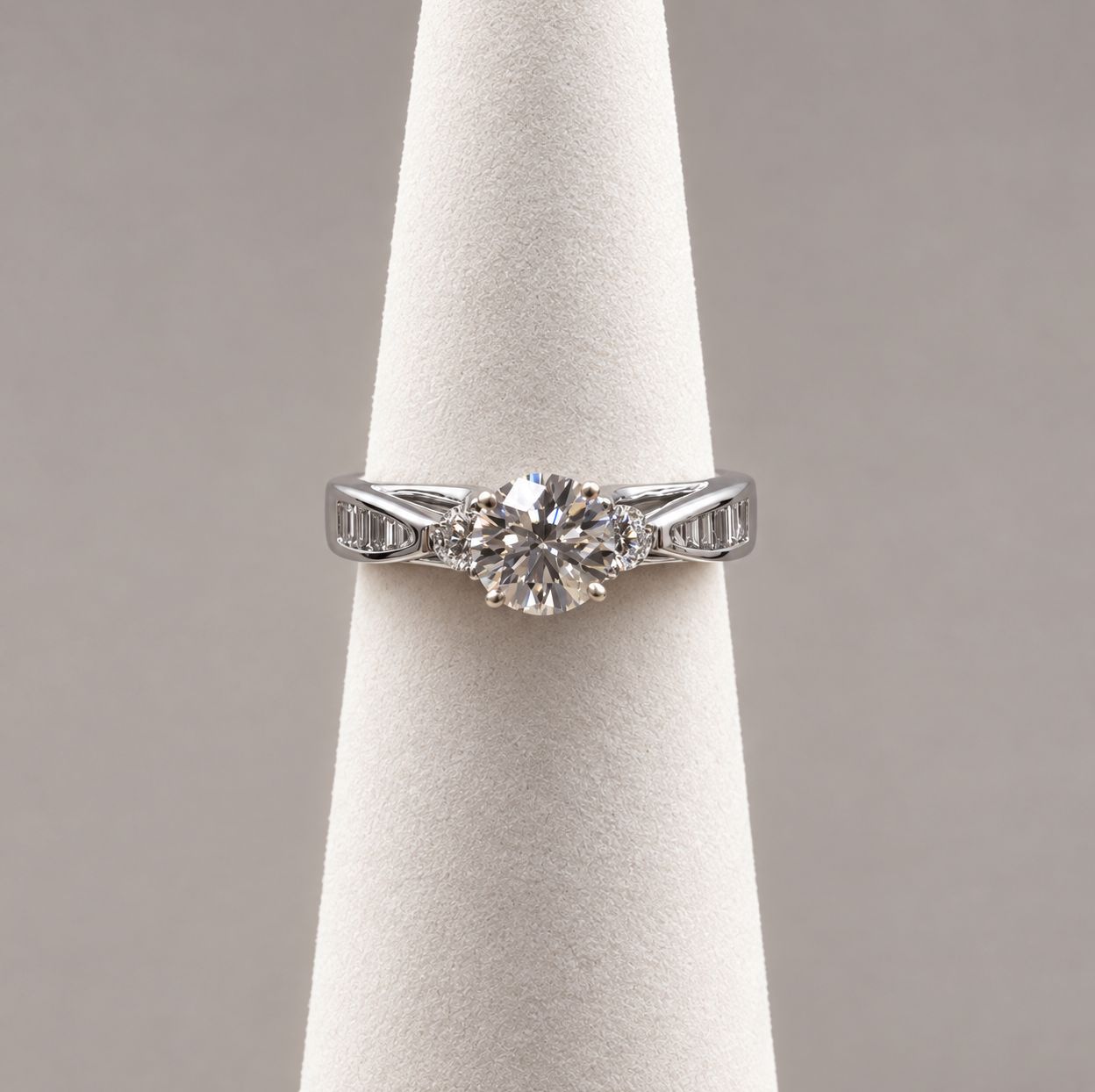 18k Round Diamond Ring w/ Emerald Cut Side Stones
