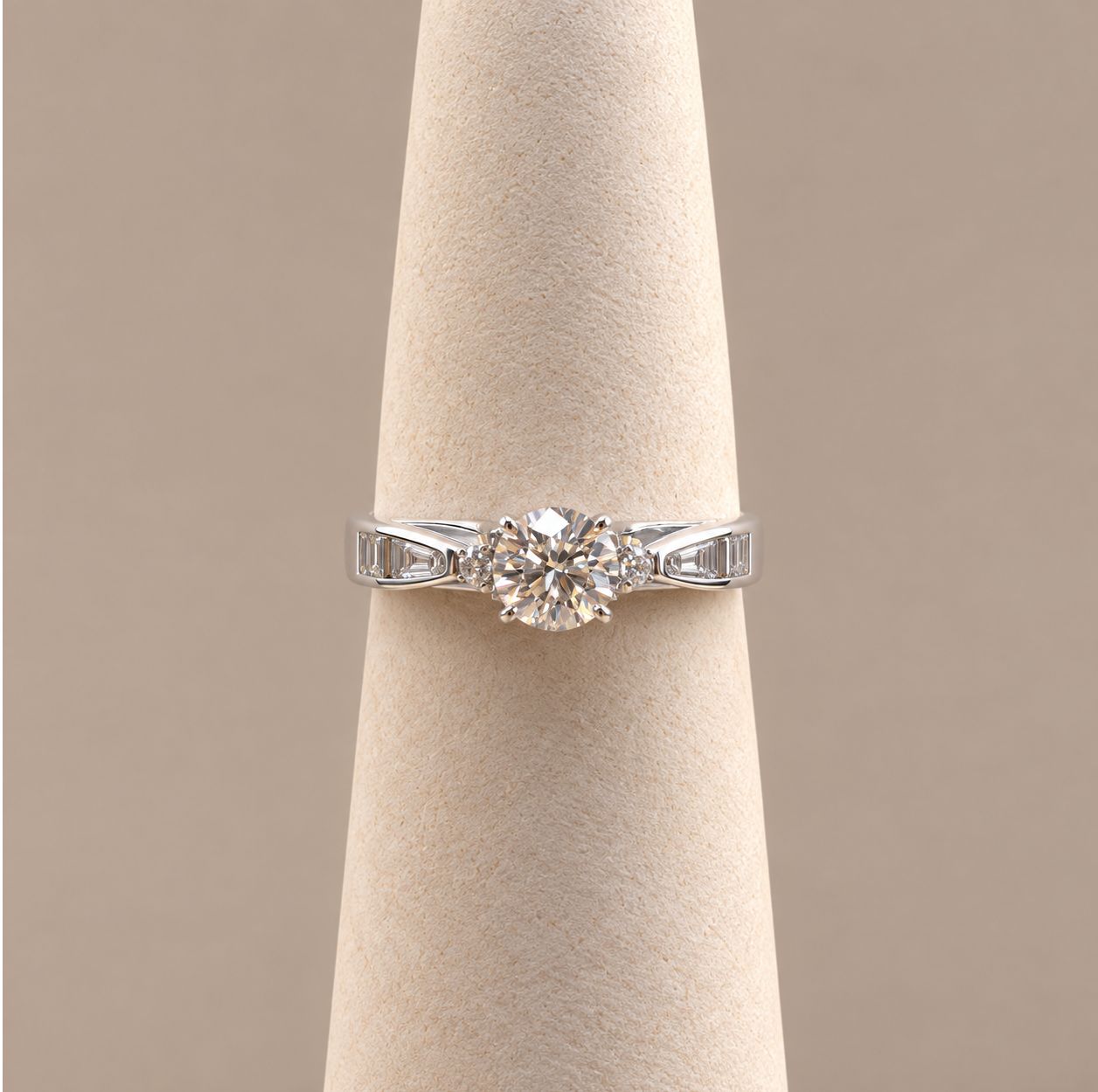 Round Diamond Ring with Emerald Cut Side Stones