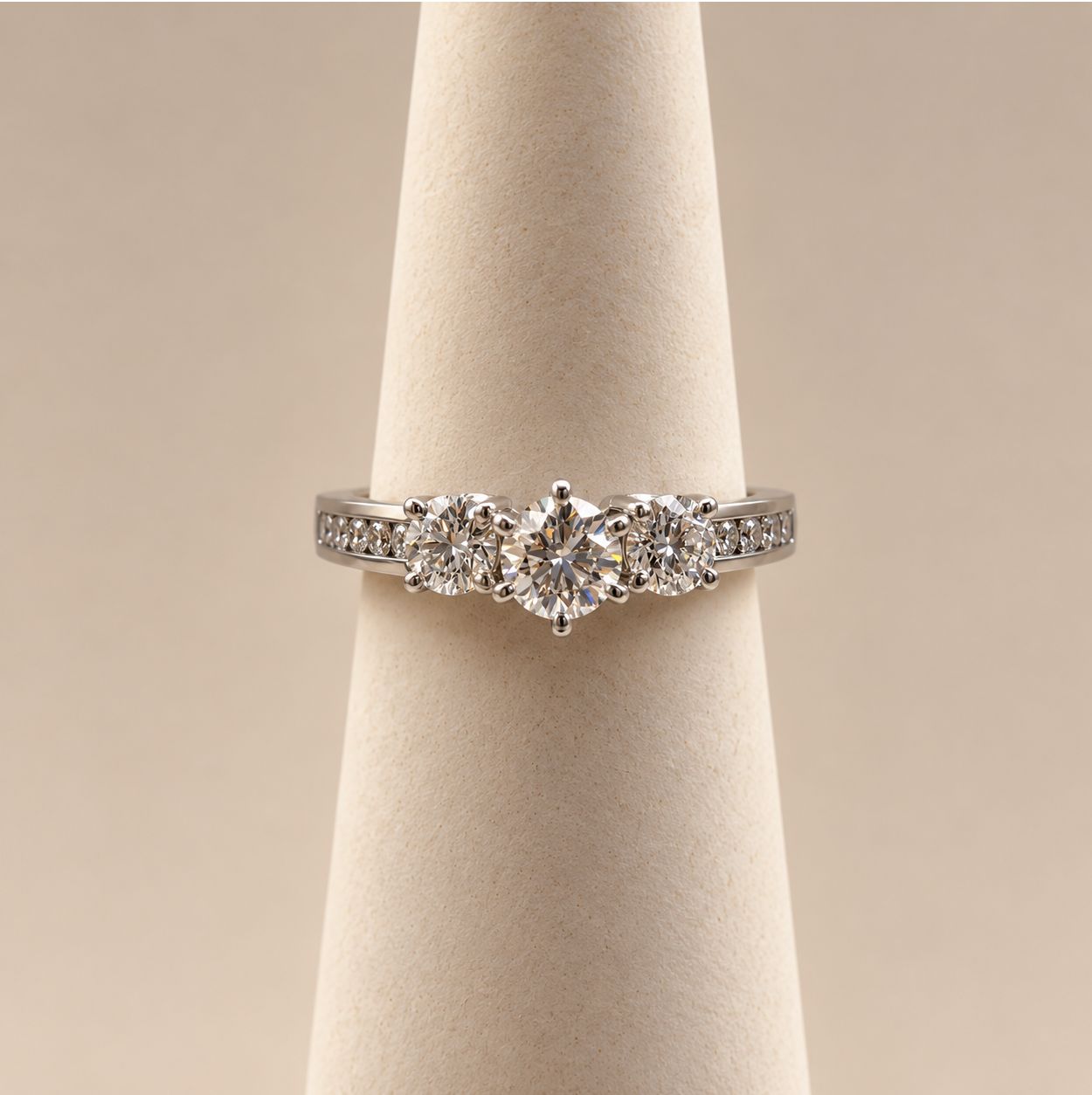 Classic Round Three-Stone Diamond Ring with Channel Band