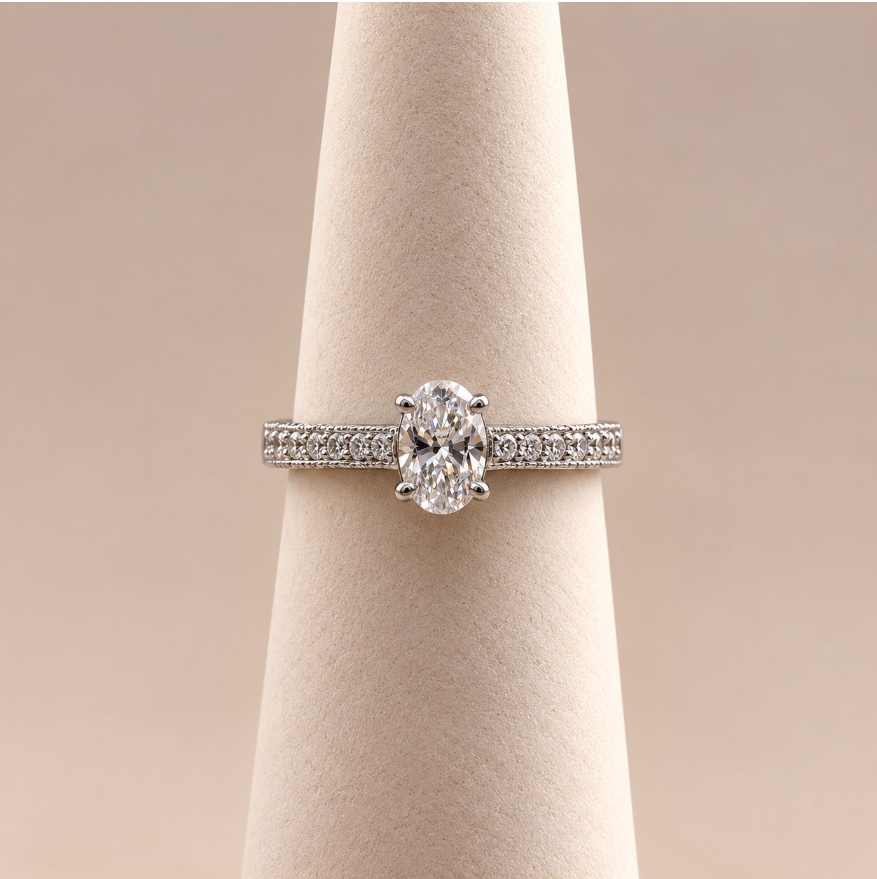 Oval Diamond Ring with Pinched Pavé Band