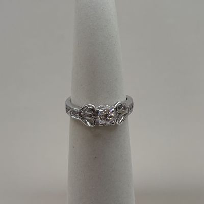 18KW "Hearts" Side Rou Dia Eng Ring