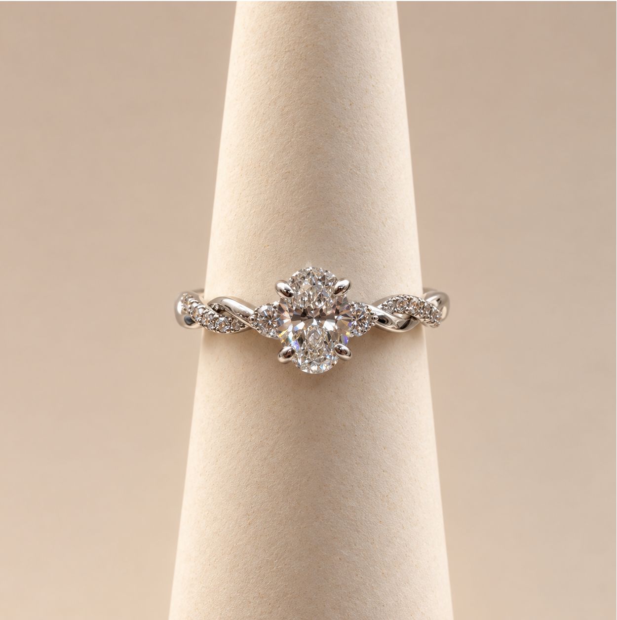 Oval Diamond Solitaire Diamond Ring with Twisted Pavé Band