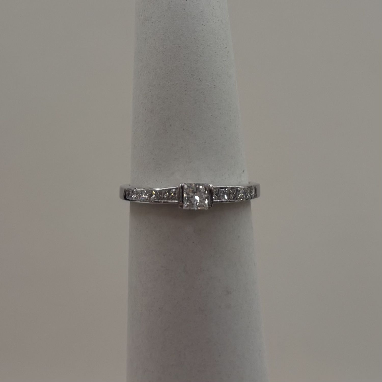 18KW LM- Prin Channel w/ 0.21ct Princess VS1 Diamond Ring