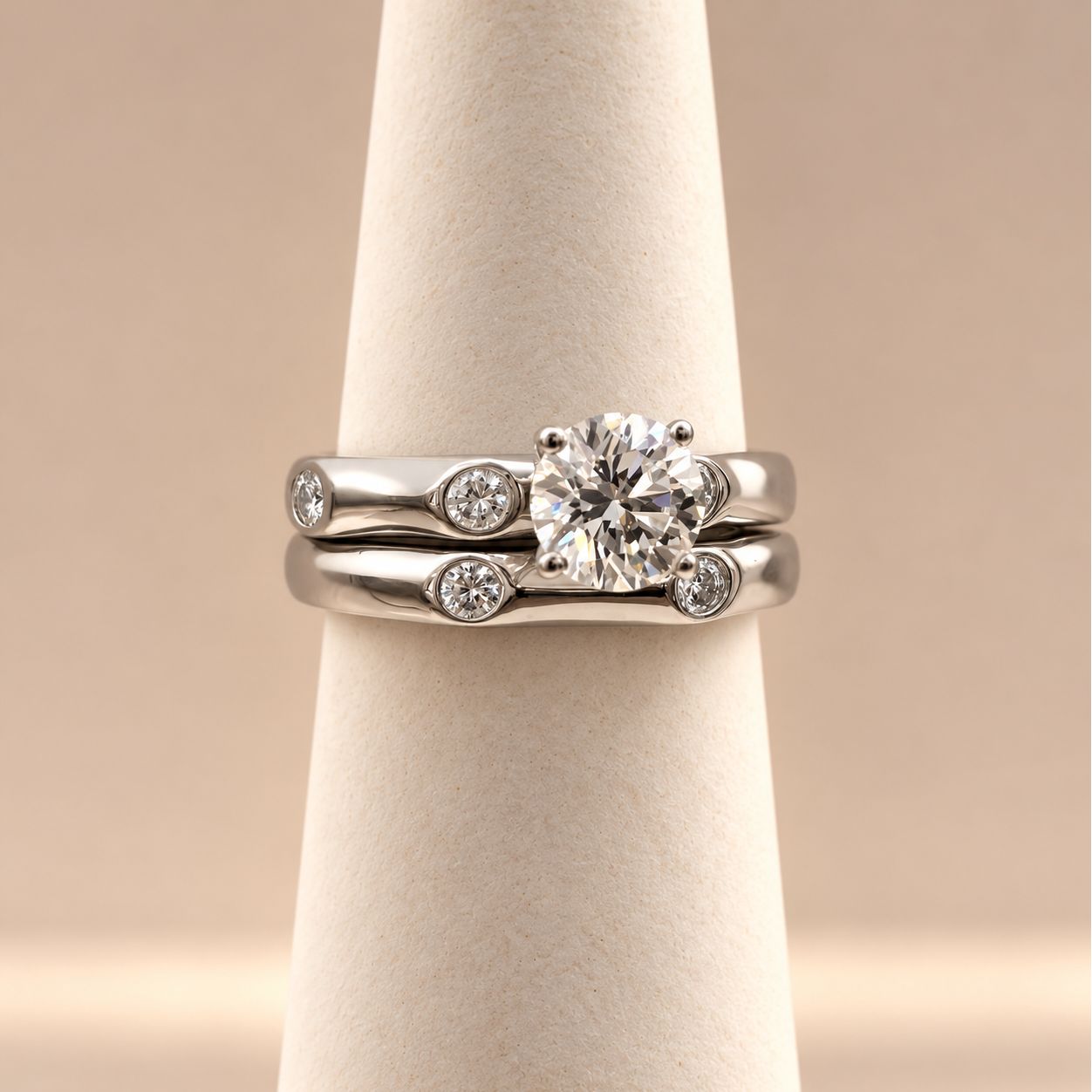 Modern Round Cut Diamond Ring with Flush-Set Side Stones