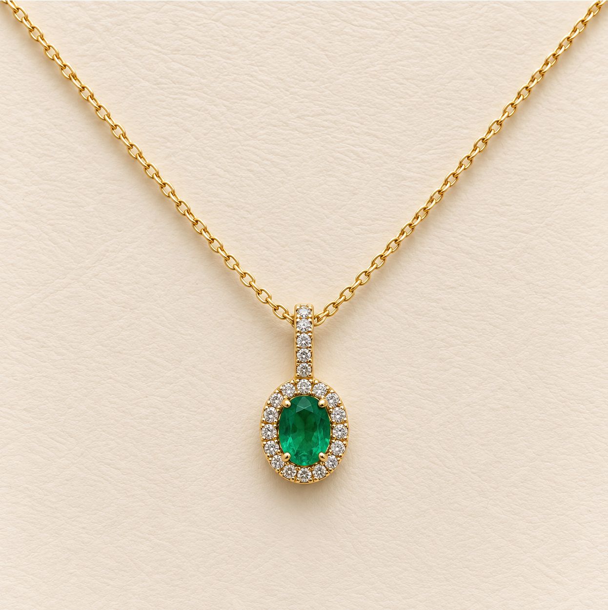 Emerald  and Diamond Oval Halo Pendant