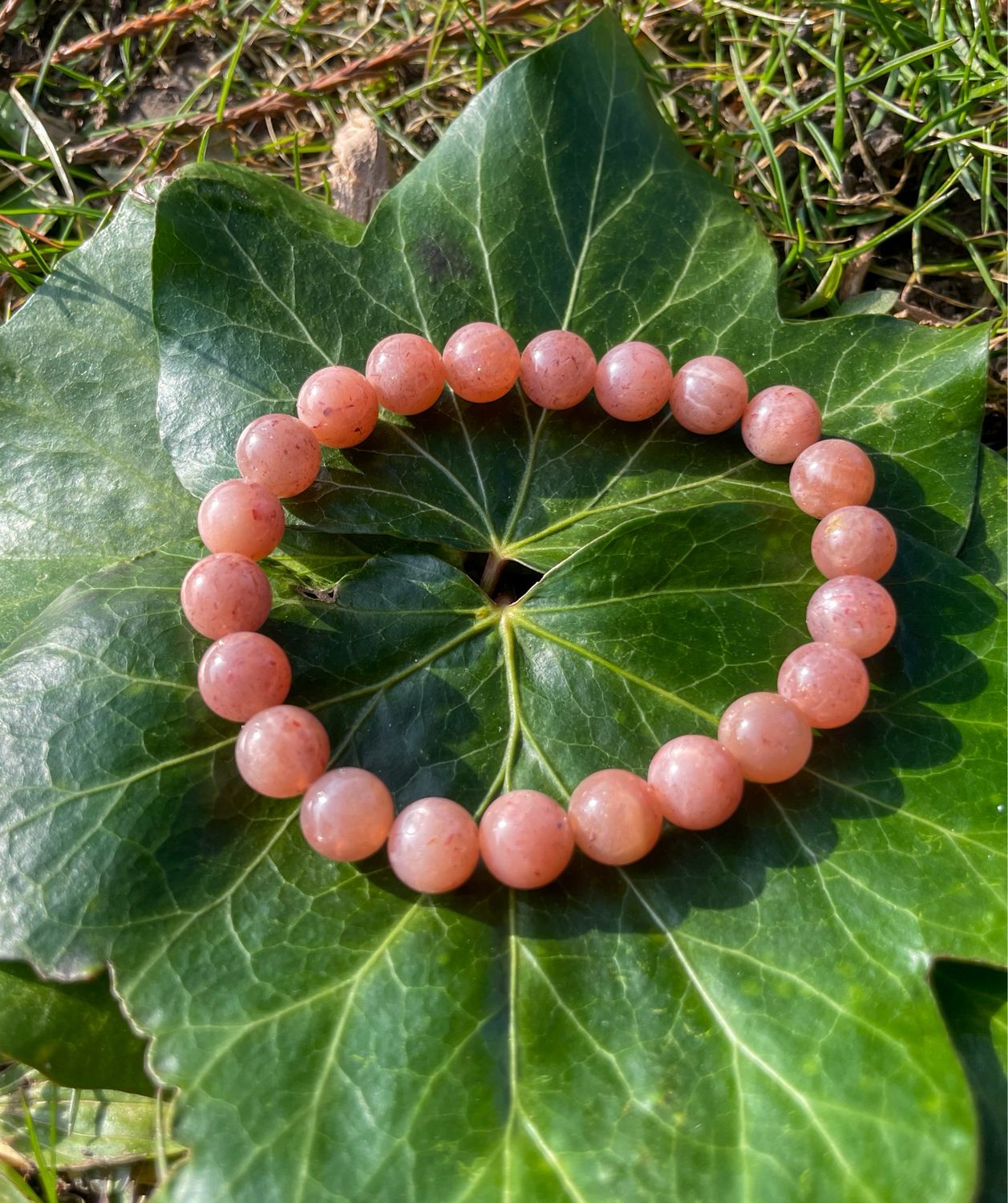 Bracelet en Pierre de lune orangée  8 mm