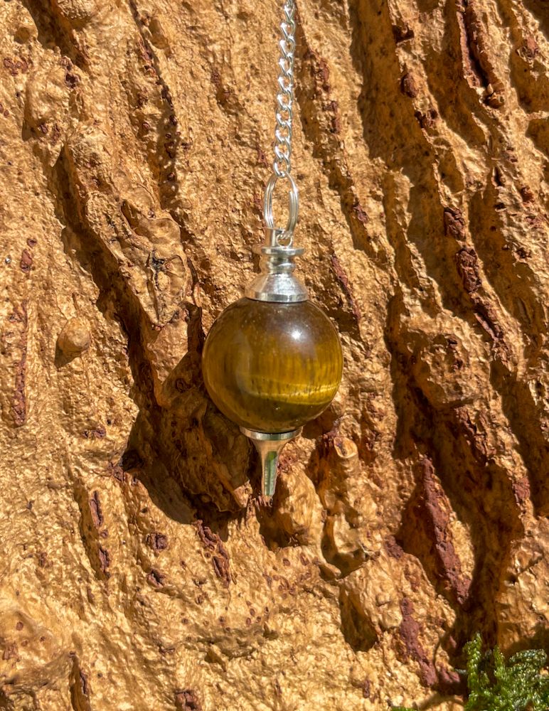 Pendule boule en Oeil de tigre Sépheroton