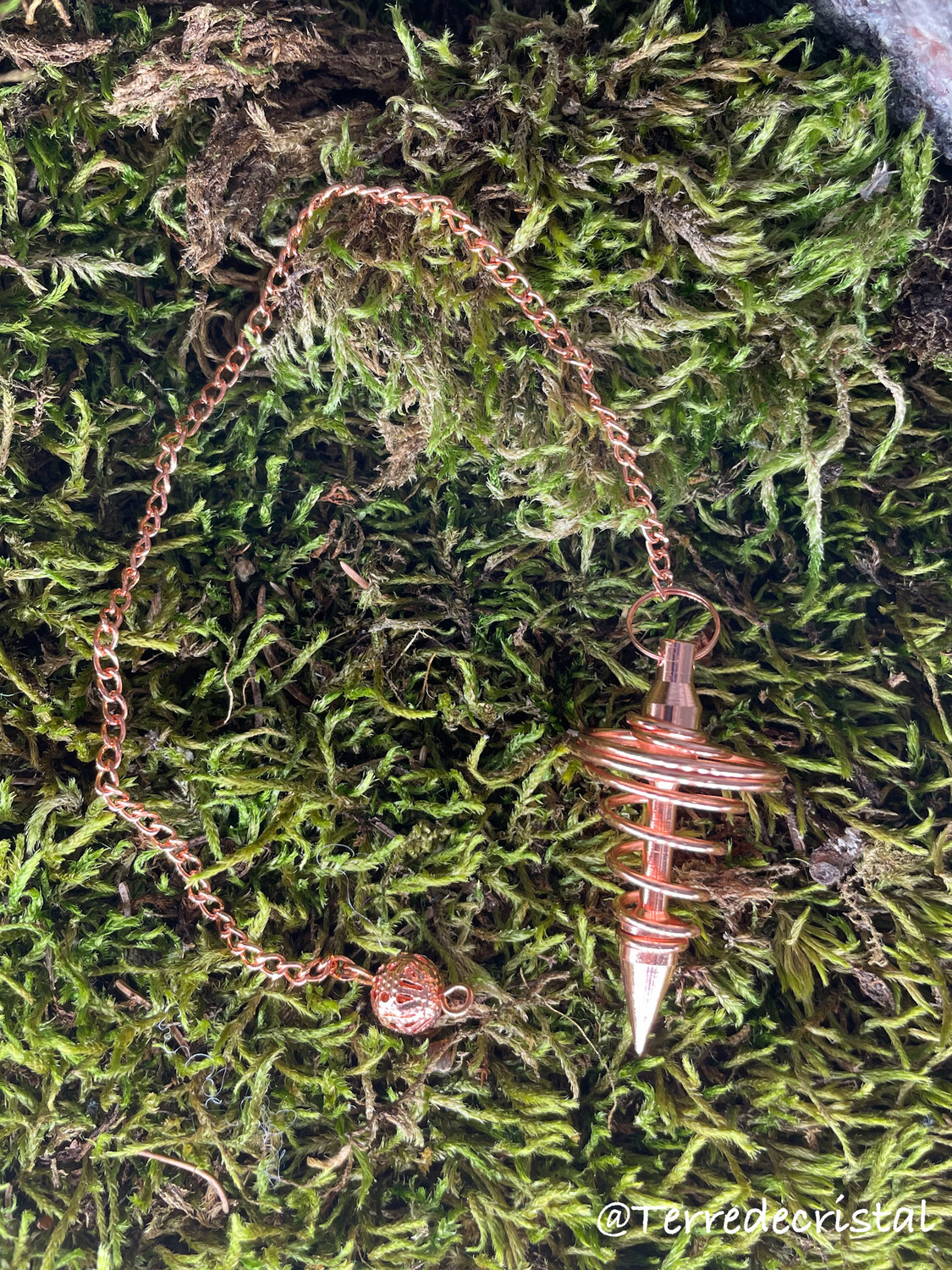 Pendule spirale cuivré