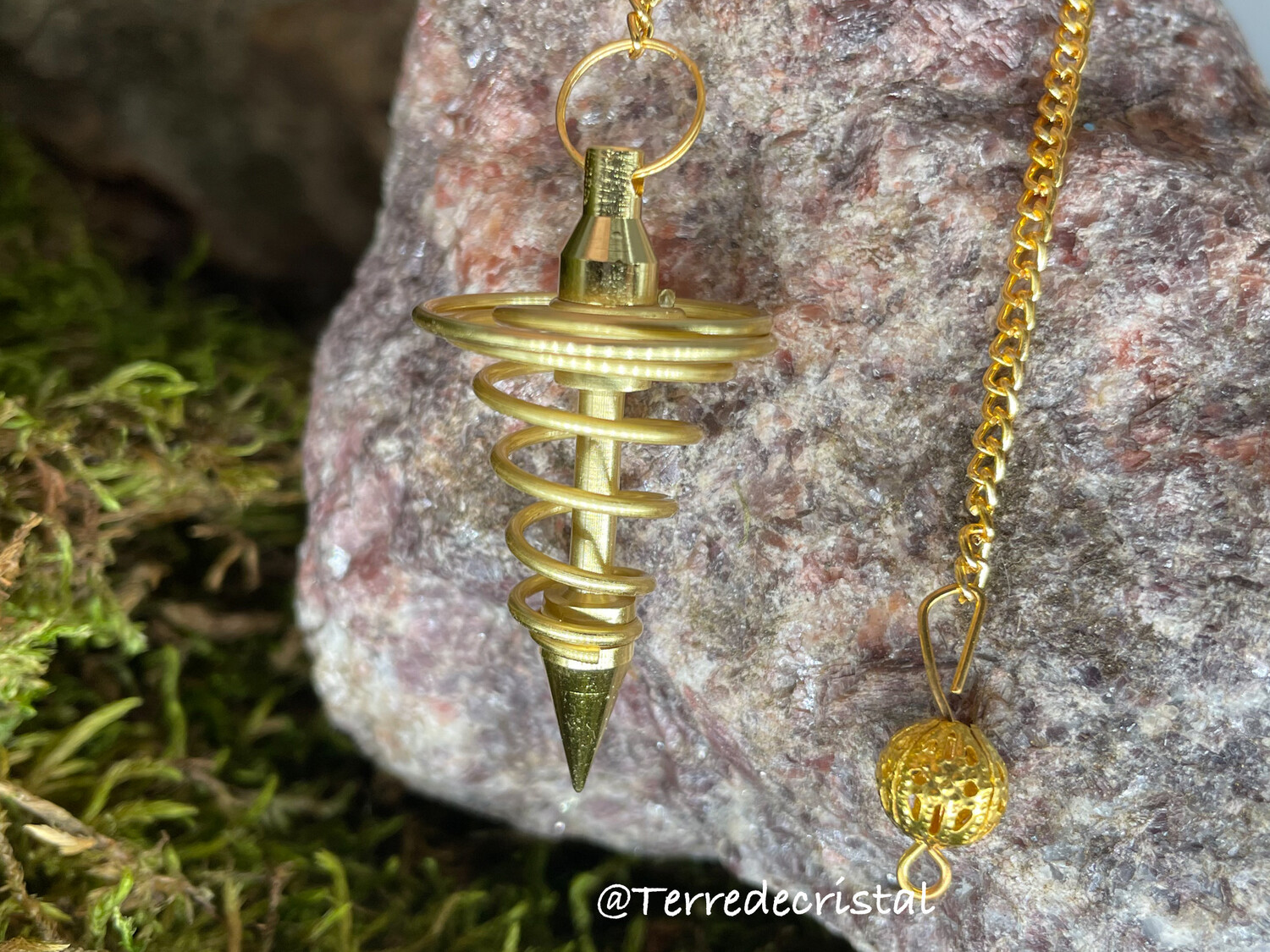 Pendule spirale doré