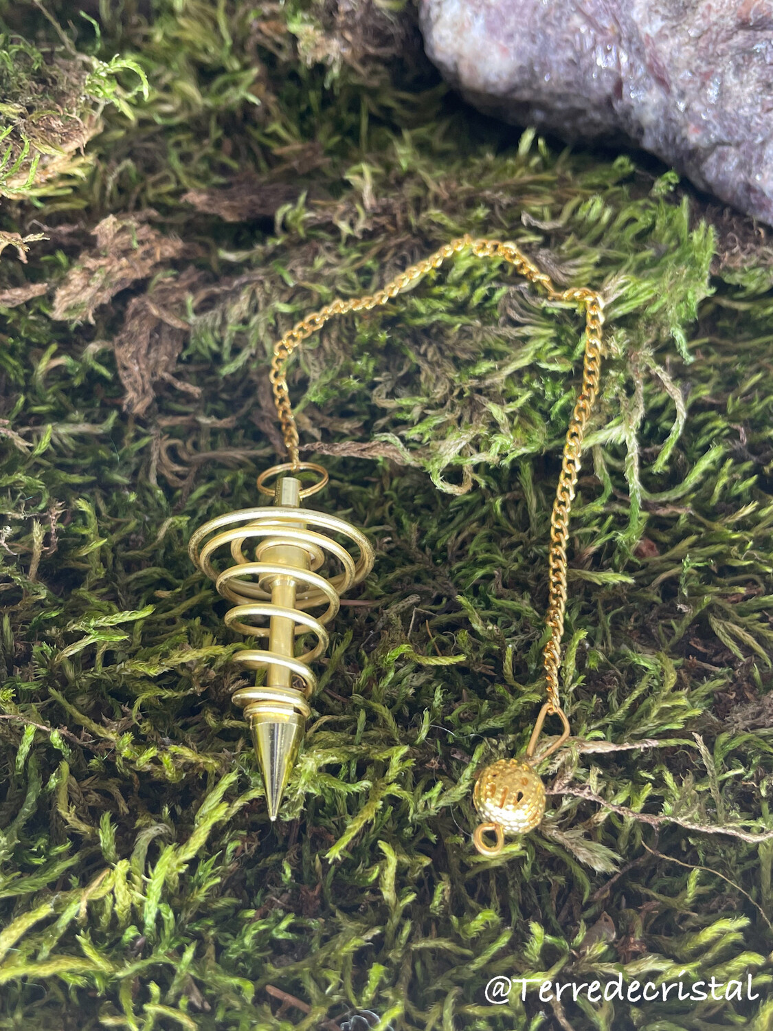 Pendule spirale doré