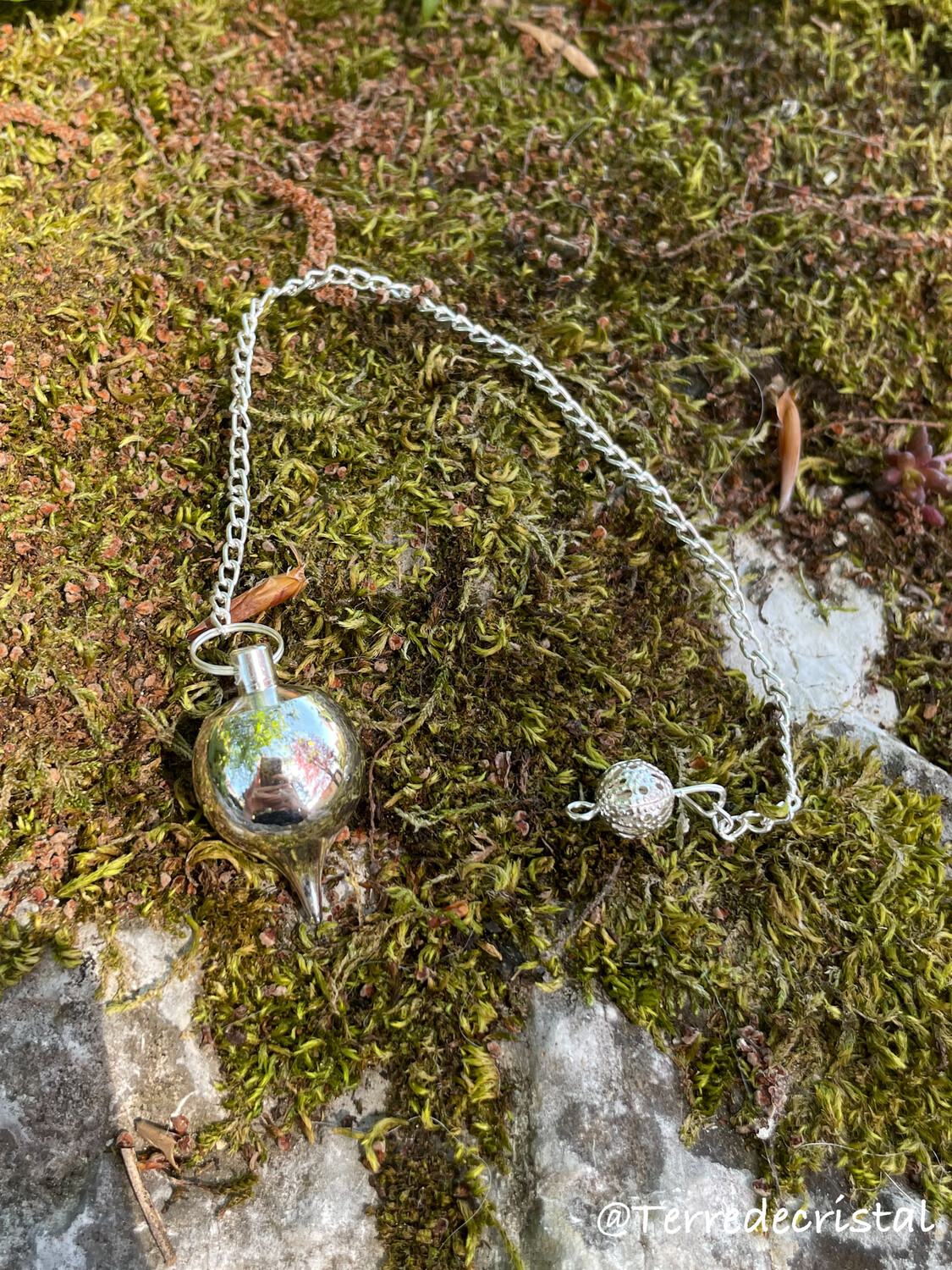 Pendule boule argenté Séphoroton