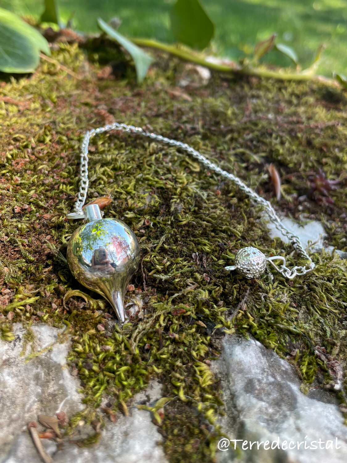 Pendule boule argenté Séphoroton