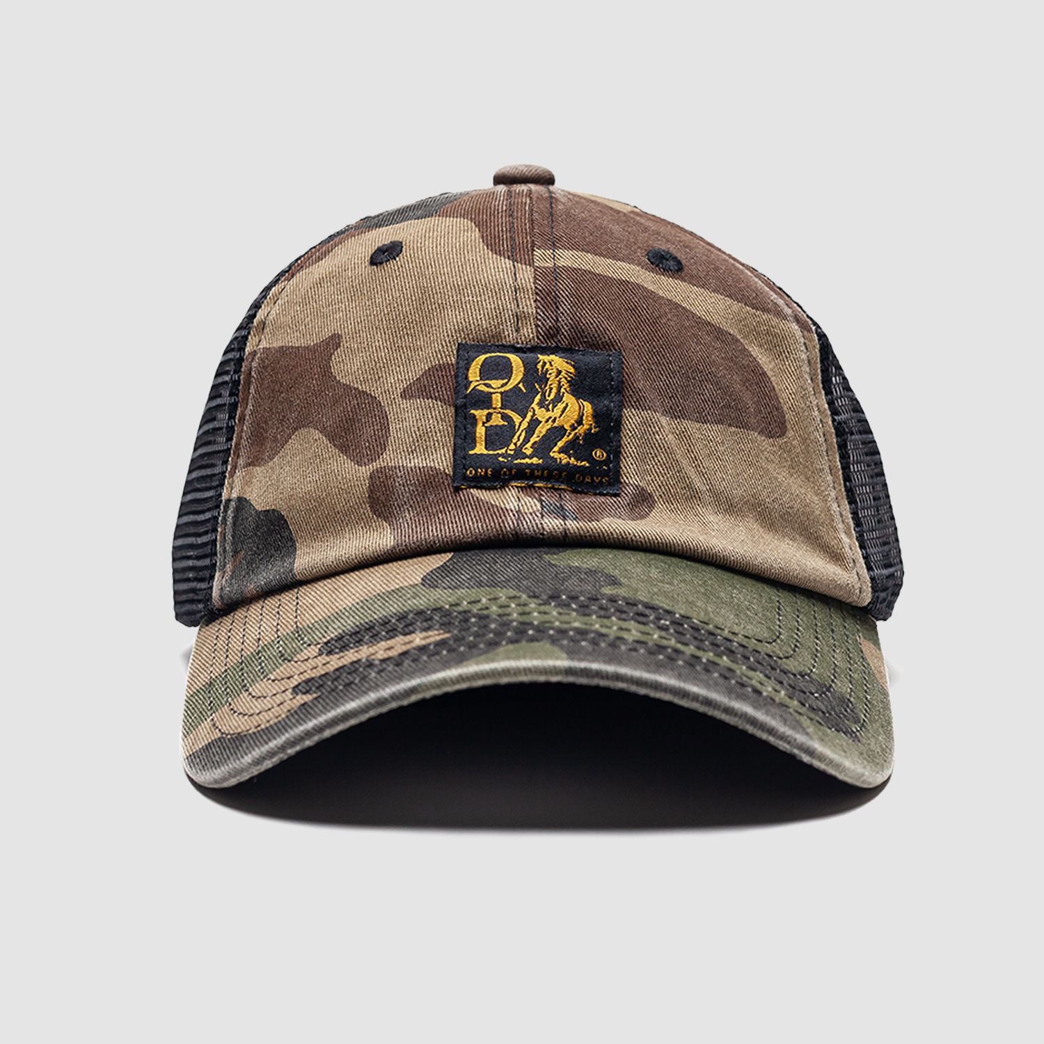 Woven Label Trucker Hat Woodland Camo