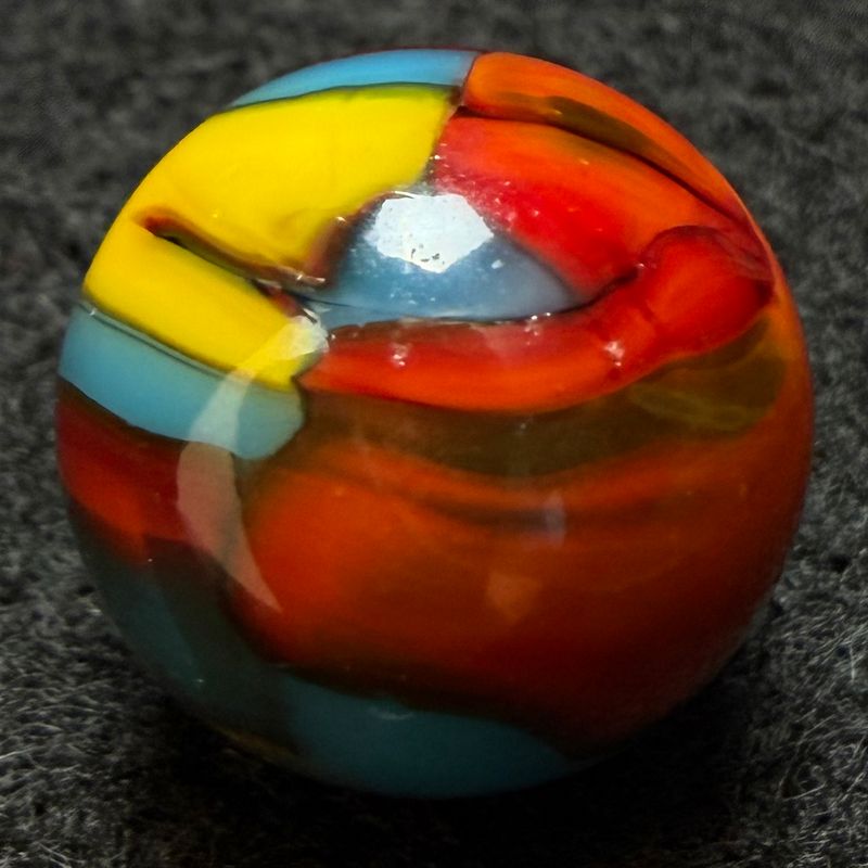 PELTIER GLASS CO. Superman Marble (0.61 inch) Striking Pattern. Display Ready