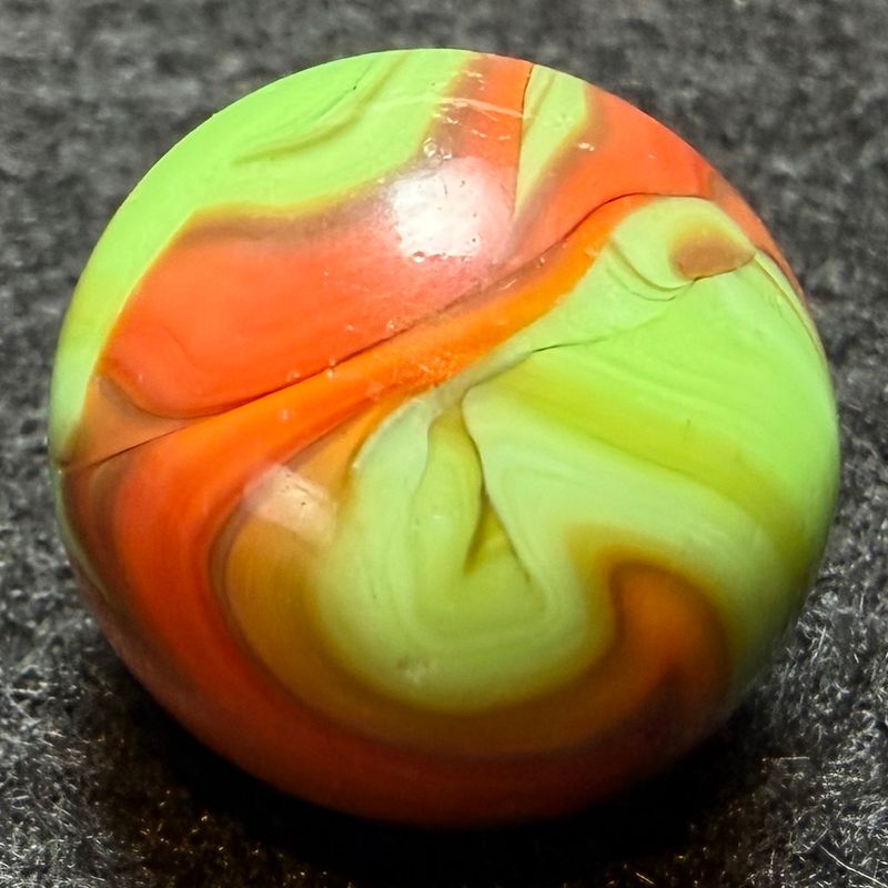 CHRISTENSEN AGATE CO, Green Base Red Swirl. Shooter Marble. 11/16" #106