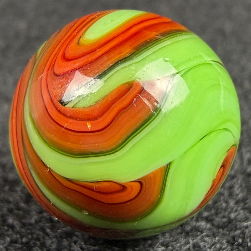 CHRISTENSEN AGATE CO. Red & Black Swirl on Green, 5/8", Mint (9.9)