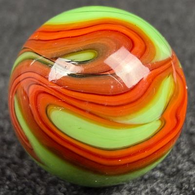 CHRISTENSEN AGATE CO. Red & Black Swirl on Green, 5/8", Mint (9.9)