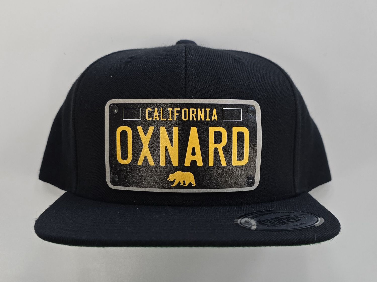 OXNARD LICENSE PLATE SNAP BACK CAP