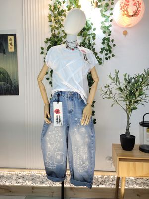 Jeansy barrel z haftami Wendy Trendy