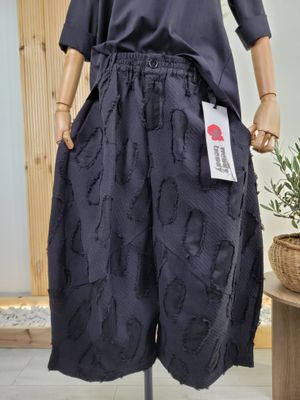 Wide barrel pants with irregular circle pattern by Wendy Trendy