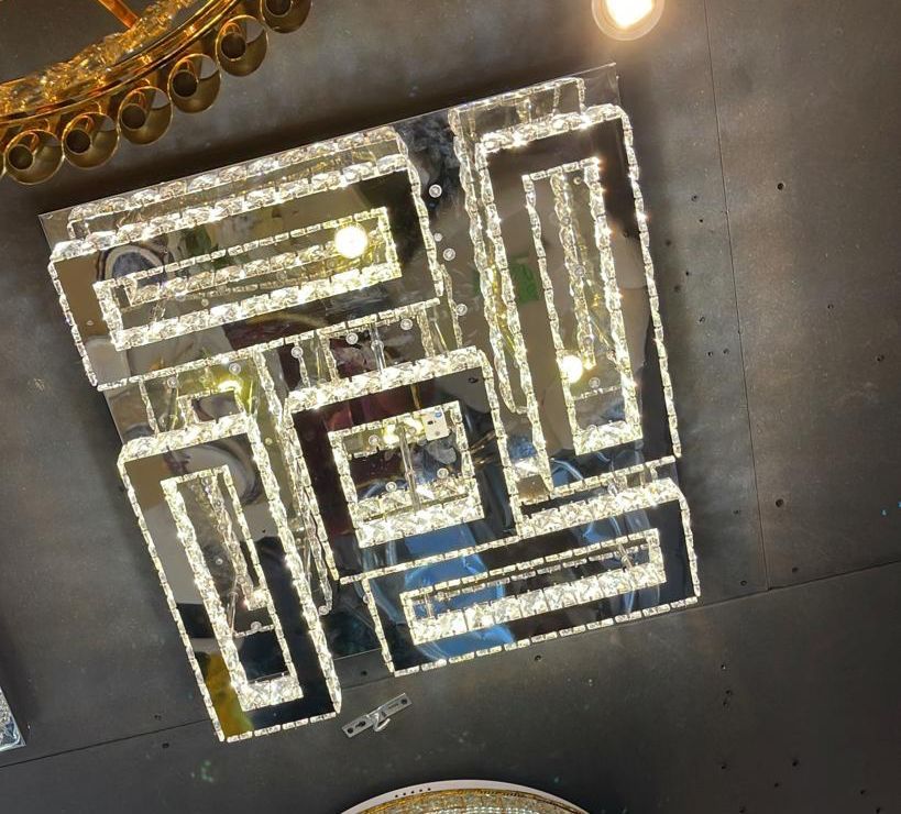 Large crystal ceiling lamp, modern design, sparkling glass details, rectangular shapes, luxurious lighting fixture for living room or hallway, elegant decorative piece.