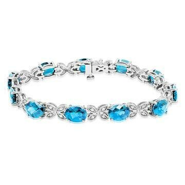 Oval Blue Topaz Butterfly Bracelet with White Sapphires Oval Blue Topaz Butterfly Bracelet with White Sapphires