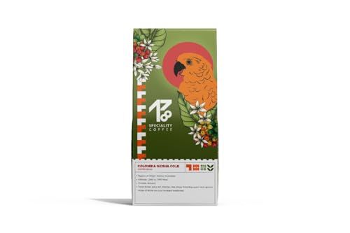 1718 Colombia Geisha Gold Natural 250g specialty coffee packaging featuring an orange parrot and fl…