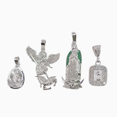 Paquete de 4 Dijes Religiosos de Plata .925 – Modelos Surtidos