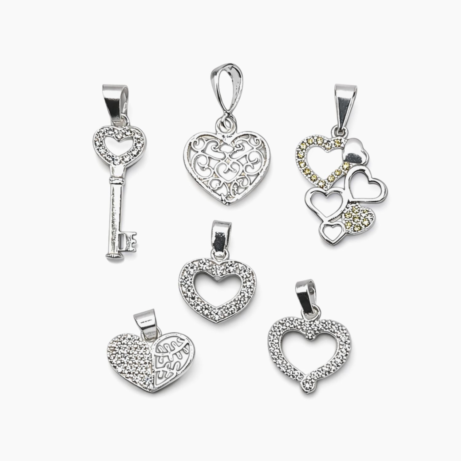 Paquete de 6 Dijes de Corazones en Plata .925