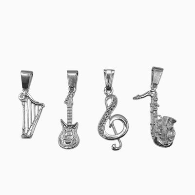 PAQUETE DE 4 DIJES MUSICALES, PLATA .925