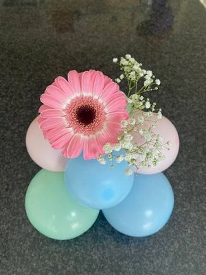 Tafelstukje met bloem.