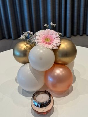 Tafelstukje met bloem.