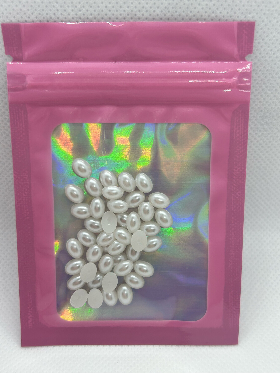 Perle ovale blanche 