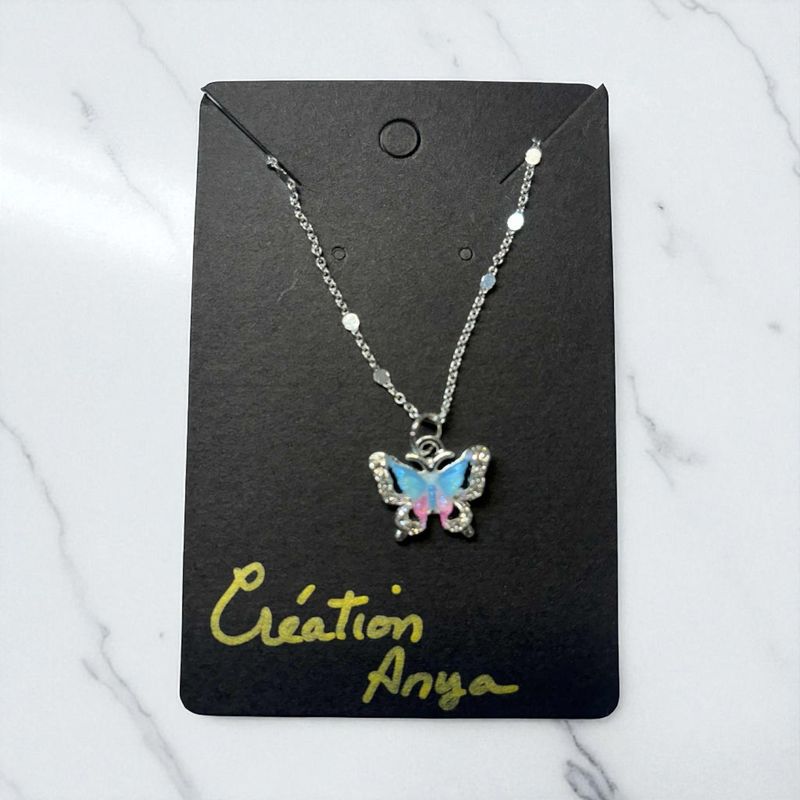 Collier papillon bleu