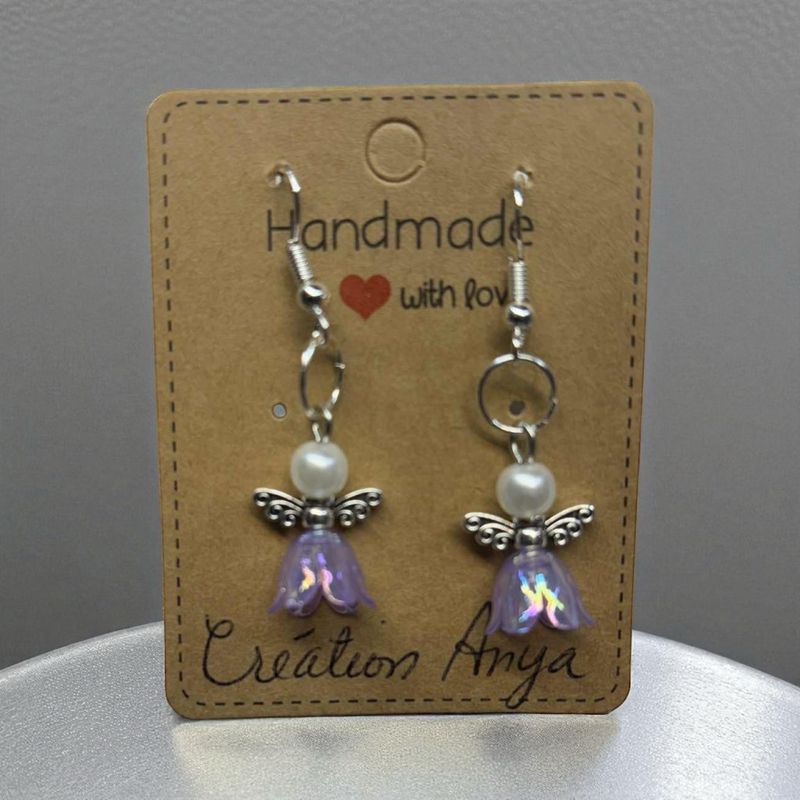 Boucle d’oreille ange lilas