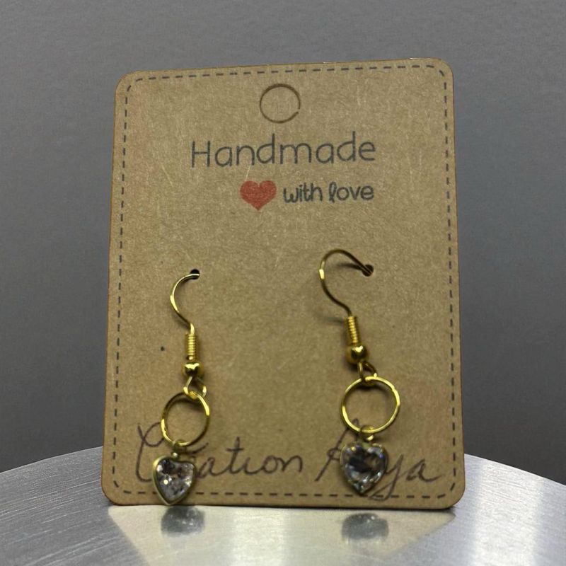 Boucle d’oreille pierre blanche