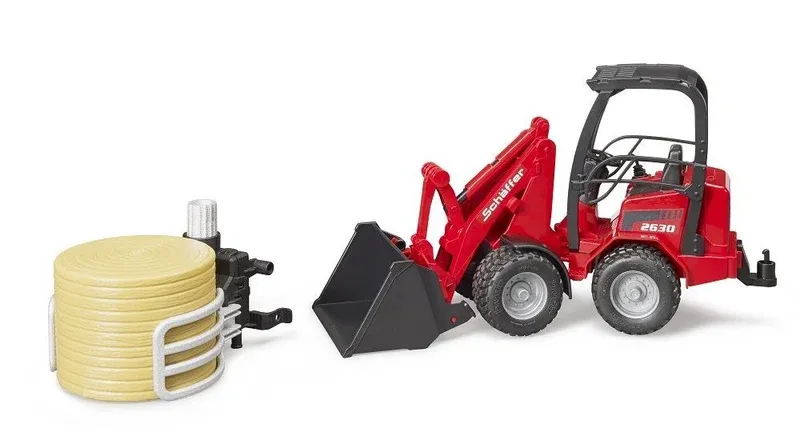 Schaeffer Compact loader With Bale Gripper and Bale