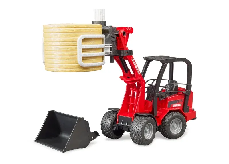 Schaeffer Compact loader With Bale Gripper and Bale