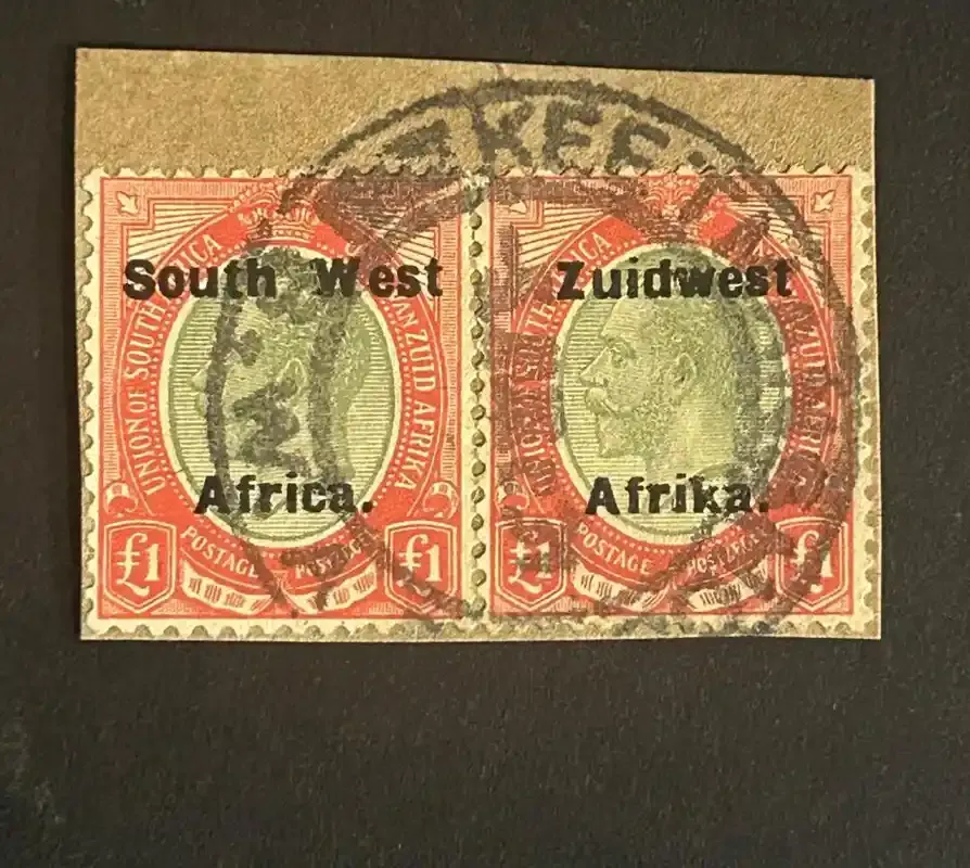 South West Africa 1924 KGV Setting VI £1 pair on piece. Cancellation "Keetmanshoop". Fine used. South West Africa 1924 KGV Setting VI £1 pair on piece. Cancellation "Keetmanshoop". Fine used.